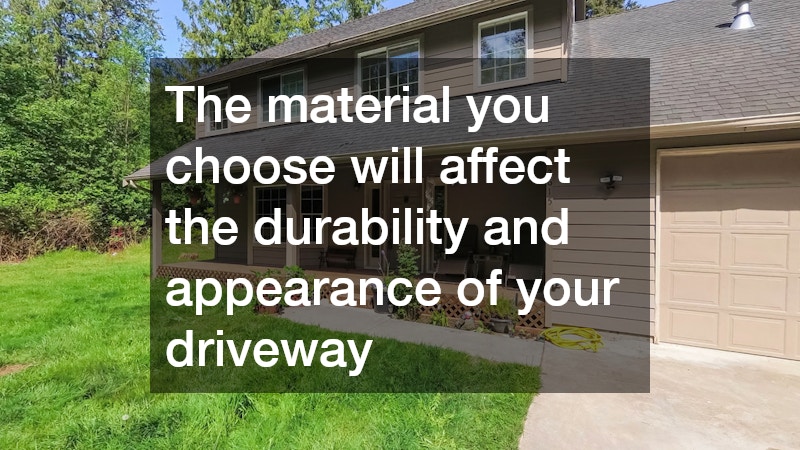 driveway surrounded by a well-trimmed lawn